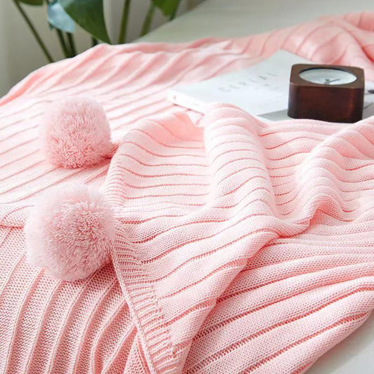 Manta de punto con pompones. Color rosa. - Oma Home