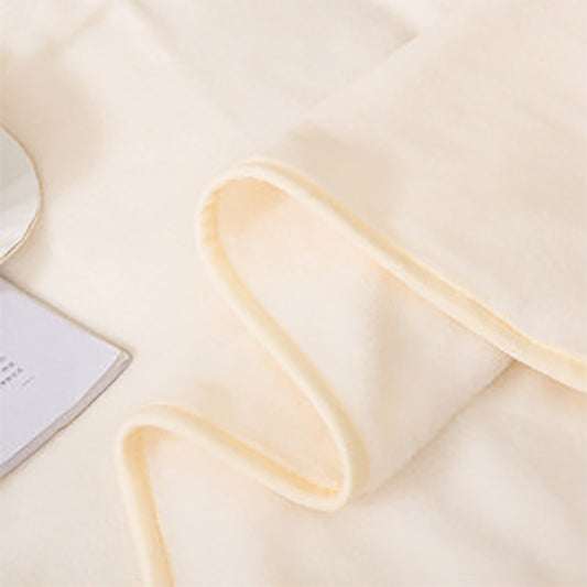 Manta de lã macia. Cor creme.