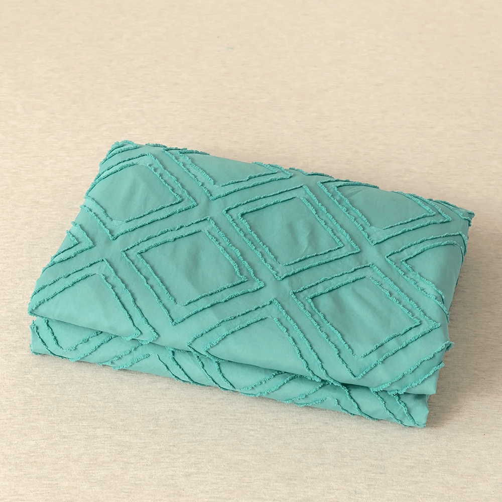 Funda Nórdica turquesa con rombos en relieve, moderna y extra suave.