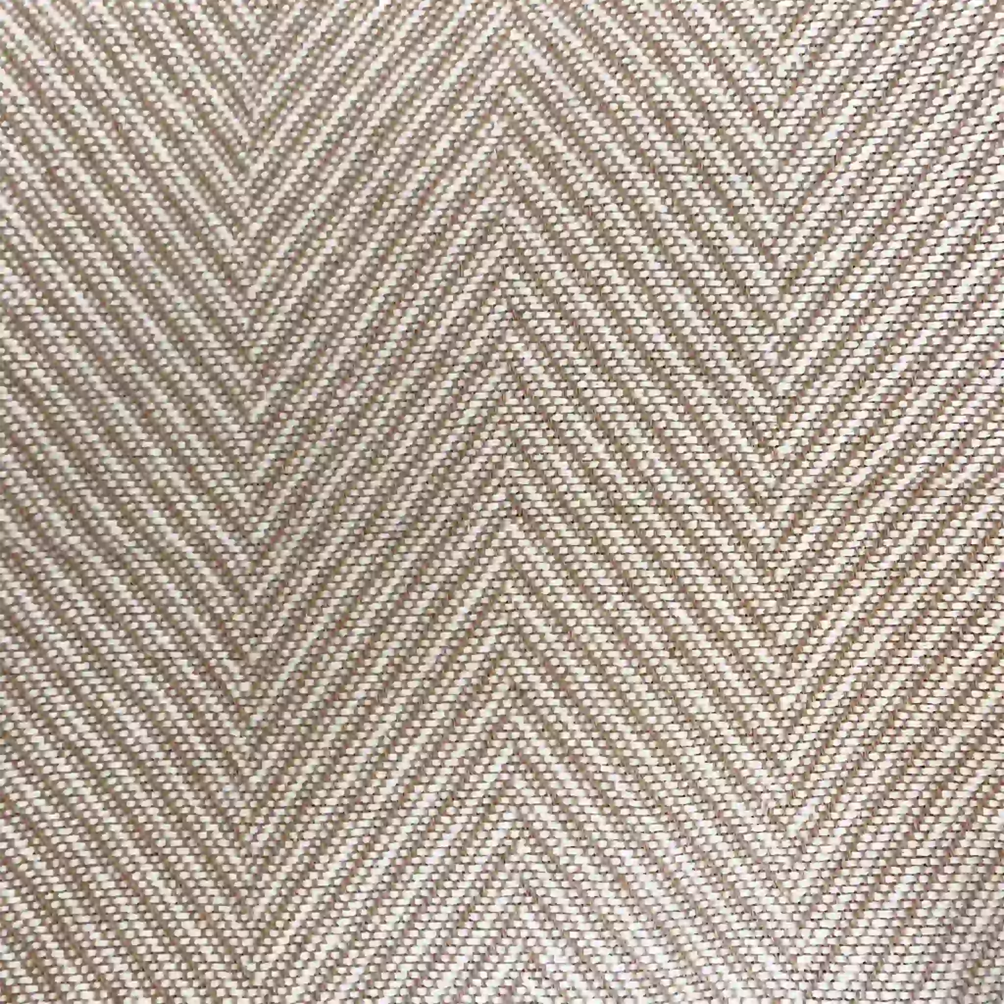 Primer plano de la textura transpirable del tejido Jacquard en forma de espiga. Composición 80% algodón y 20% poliéster que garantiza suavidad y resistencia.