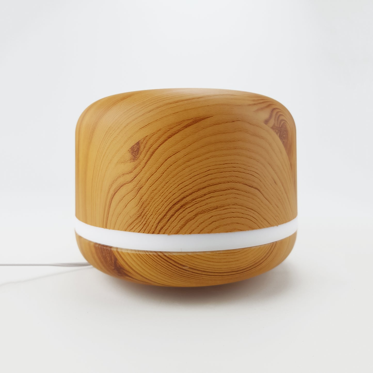 Difusor de aromas circular. Color marrón claro. - Oma Home