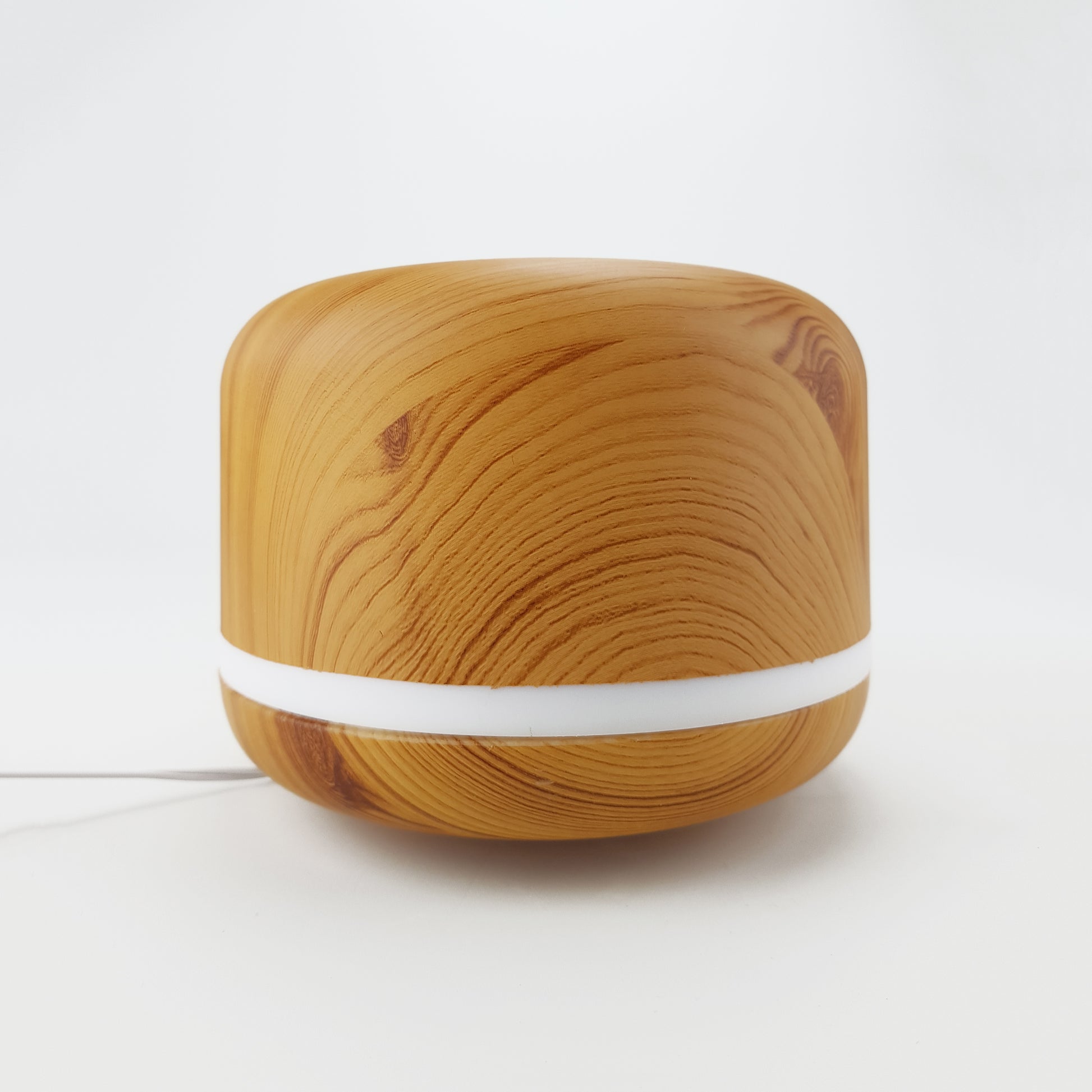 Difusor de aromas circular. Color marrón claro. - Oma Home