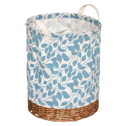 Cesta redonda de mimbre y tela floral. - Oma Home