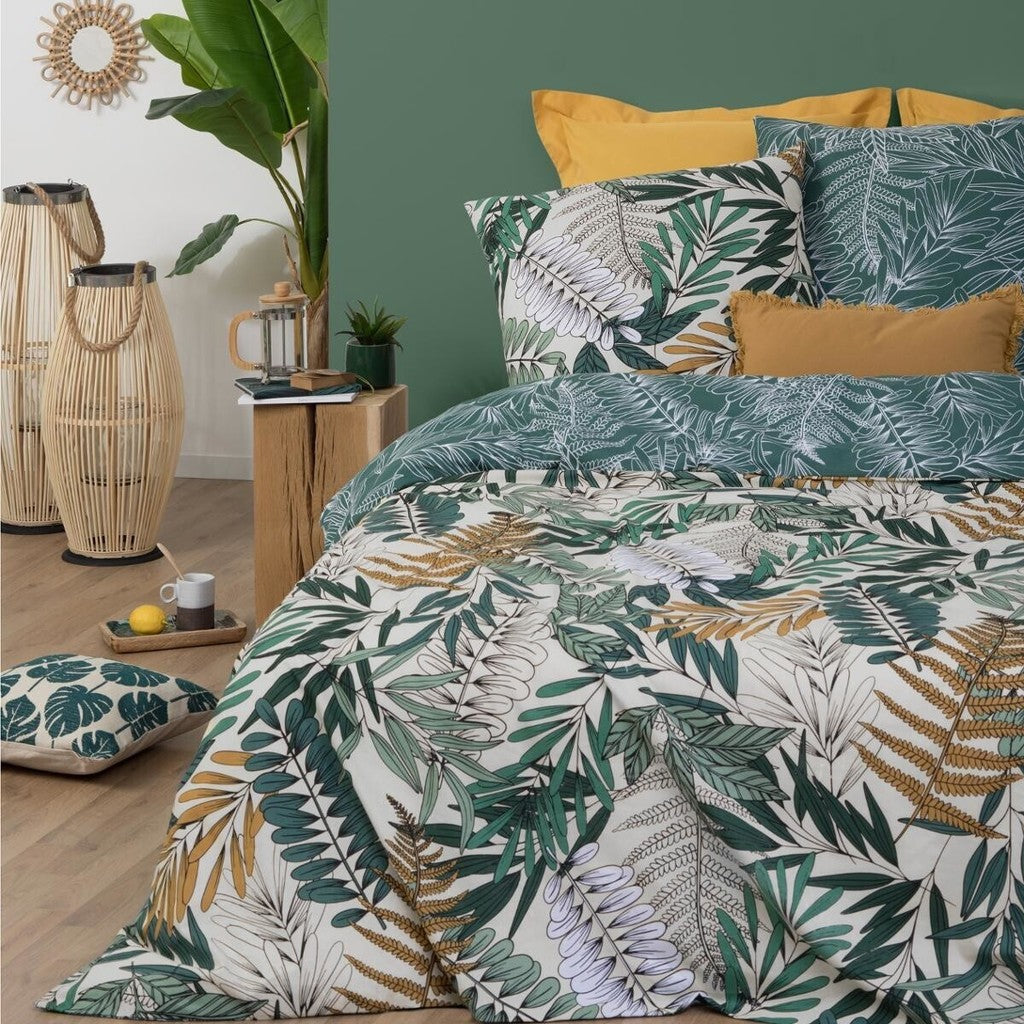 Capa de edredom reversível com estampa de Folhas Tropicais.